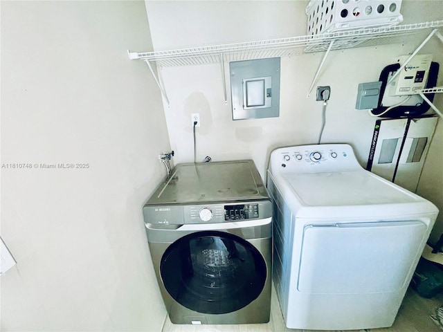 1002 S 27th Ave, Hollywood, FL 33020 - washroom with electric panel and washing machine and dryer