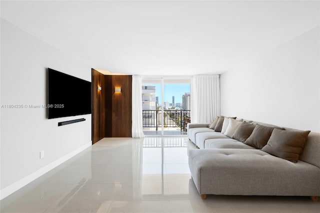 1501 S Ocean Dr Unit 1005, Hollywood, FL 33019 - living area with light tile patterned floors and floor to ceiling windows