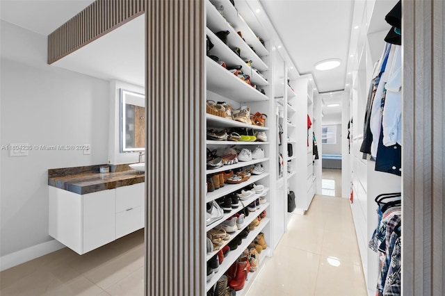 1501 S Ocean Dr Unit 1005, Hollywood, FL 33019 - walk in closet featuring light tile patterned flooring and a sink