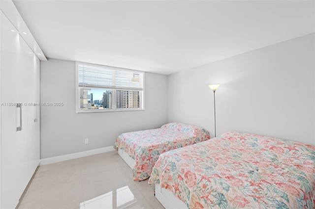 1501 S Ocean Dr Unit 1005, Hollywood, FL 33019 - tiled bedroom with baseboards and recessed lighting