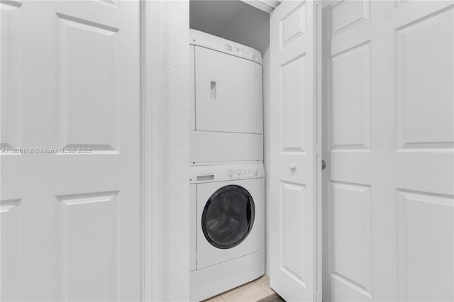1901 SW 60th Ter, North Lauderdale, FL 33068 - washroom featuring stacked washing machine and dryer and light tile patterned floors