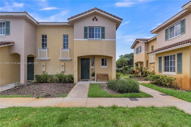 1901 SW 60th Ter, North Lauderdale, FL 33068 - townhome / multi-family property with stucco siding and a tile roof