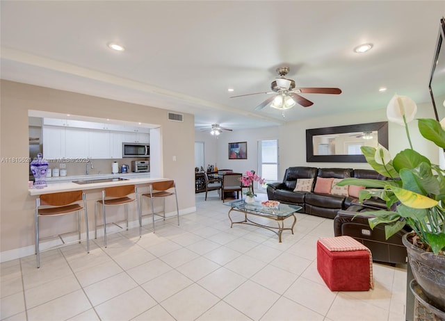 7201 NW 67th St, Tamarac, FL 33321 - living area featuring recessed lighting, baseboards, ceiling fan, and light tile patterned floors