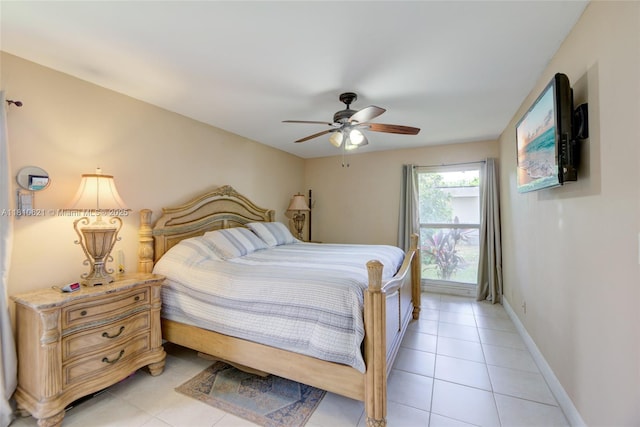 7201 NW 67th St, Tamarac, FL 33321 - bedroom with light tile patterned flooring, ceiling fan, and baseboards