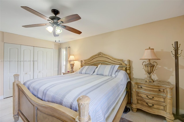 7201 NW 67th St, Tamarac, FL 33321 - bedroom with light tile patterned floors, a closet, a ceiling fan, and baseboards