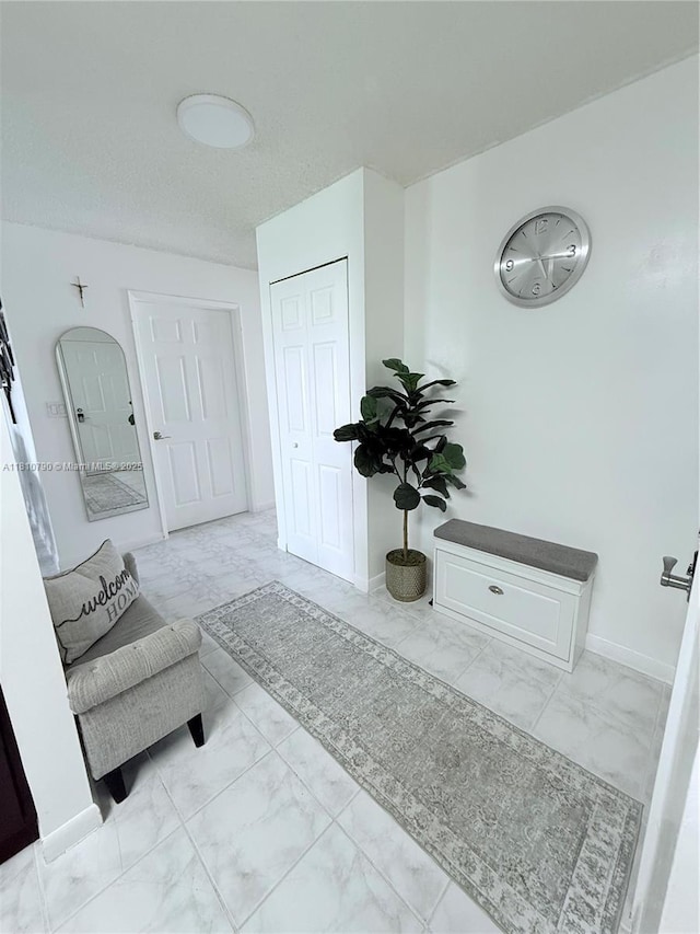 15741 SW 137th Ave Unit 206, Miami, FL 33177 - living room with marble look tiles and baseboards