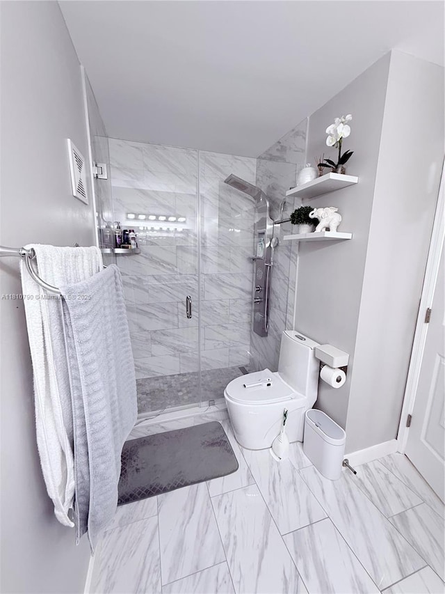 15741 SW 137th Ave Unit 206, Miami, FL 33177 - bathroom featuring toilet, marble finish flooring, and a shower stall