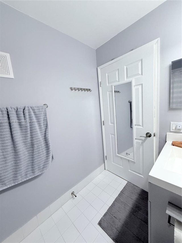 15741 SW 137th Ave Unit 206, Miami, FL 33177 - bathroom featuring vanity, tile patterned flooring, and baseboards