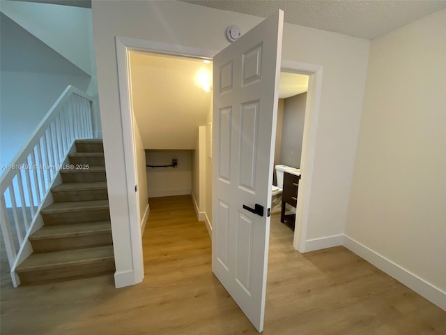 120 Heritage Way, West Palm Beach, FL 33407 - stairway with wood finished floors and baseboards