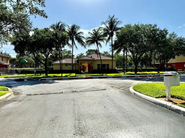 3340 Palomino Dr Unit 211-2, Davie, FL 33024 - view of asphalt street with curbs