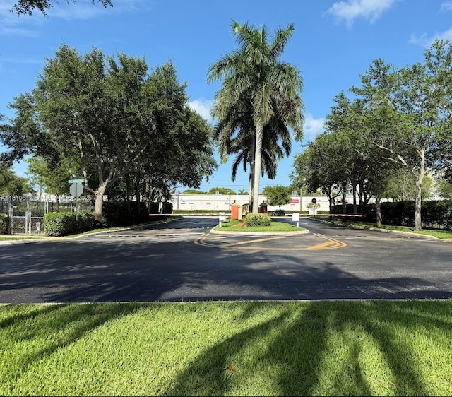 3340 Palomino Dr Unit 211-2, Davie, FL 33024 - view of asphalt street featuring traffic signs