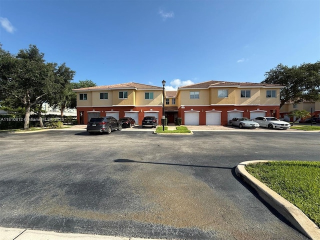 3340 Palomino Dr Unit 211-2, Davie, FL 33024 - view of front of home featuring stucco siding