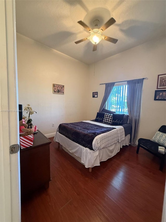 3340 Palomino Dr Unit 211-2, Davie, FL 33024 - bedroom with wood finished floors, baseboards, and ceiling fan