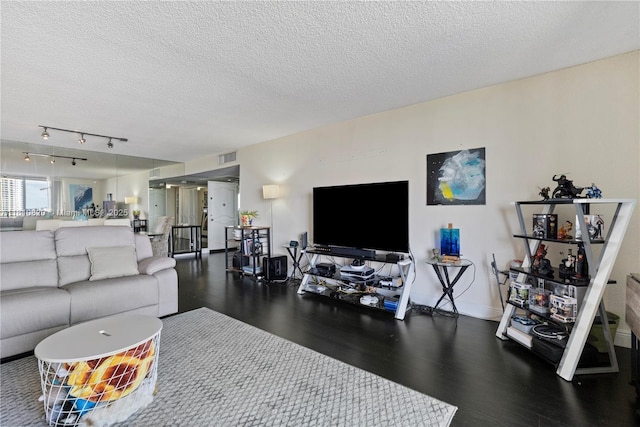 500 Three Islands Blvd Unit 1112, Hallandale Beach, FL 33009 - living room with wood finished floors, a textured ceiling, and baseboards