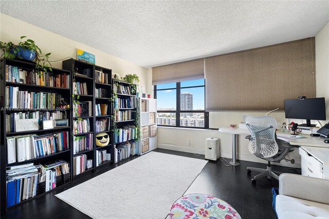 500 Three Islands Blvd Unit 1112, Hallandale Beach, FL 33009 - office featuring a textured ceiling, baseboards, and wood finished floors