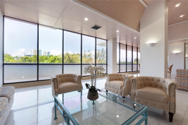 500 Three Islands Blvd Unit 1112, Hallandale Beach, FL 33009 - common area with a towering ceiling, recessed lighting, and floor to ceiling windows