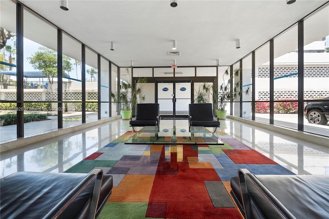 500 Three Islands Blvd Unit 1112, Hallandale Beach, FL 33009 - building lobby featuring a wall of windows