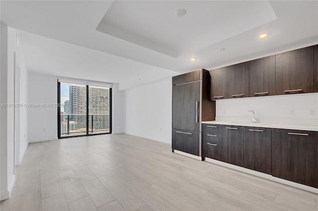 45 SW 9th St Unit 2105, Miami, FL 33130 - bar with recessed lighting, paneled built in fridge, a raised ceiling, and light wood finished floors