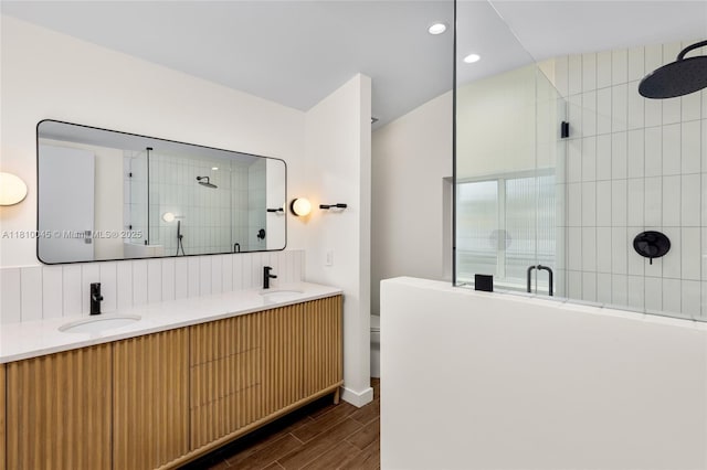 266 NW 42nd St, Miami, FL 33127 - bathroom featuring a stall shower, wood tiled floors, double vanity, toilet, and recessed lighting