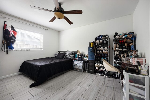 3430 N 65th Ave, Hollywood, FL 33024 - bedroom featuring wood tiled floors, ceiling fan, and baseboards