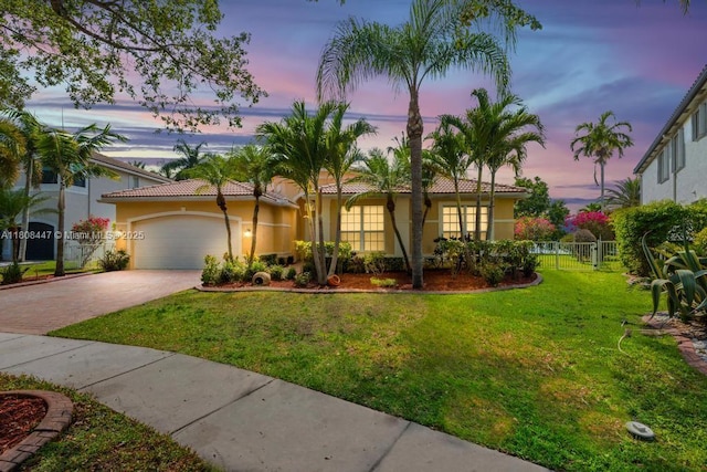 4506 SW 186th Way, Miramar, FL 33029 - view of front of house featuring driveway, a garage, stucco siding, and a tiled roof