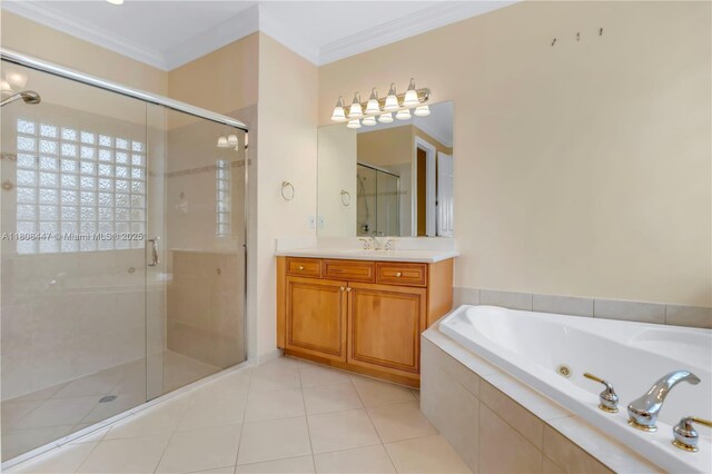 4506 SW 186th Way, Miramar, FL 33029 - bathroom with a jetted tub, a shower stall, vanity, crown molding, and tile patterned flooring