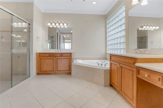 4506 SW 186th Way, Miramar, FL 33029 - full bath with a stall shower, two vanities, a bath, crown molding, and tile patterned flooring