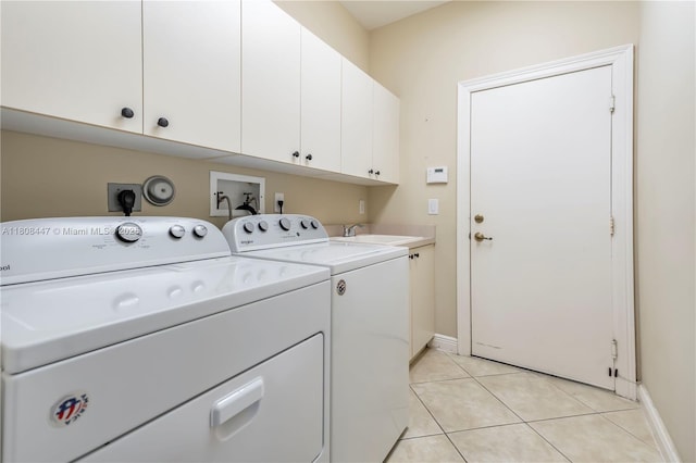4506 SW 186th Way, Miramar, FL 33029 - laundry room with washing machine and clothes dryer, cabinet space, light tile patterned floors, and baseboards