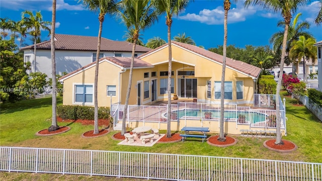 4506 SW 186th Way, Miramar, FL 33029 - back of house with a tiled roof, stucco siding, and a patio