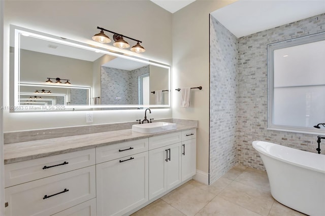 15122 SW 34th St, Davie, FL 33331 - bathroom featuring vanity, tile patterned flooring, and a soaking tub
