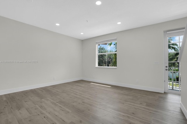 4123 Parkside Dr, Jupiter, FL 33458 - unfurnished room featuring wood finished floors, baseboards, and recessed lighting