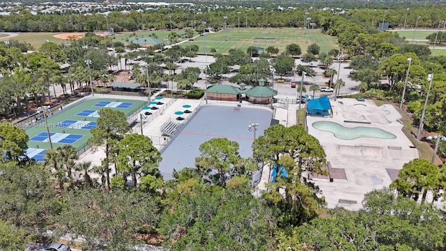 4123 Parkside Dr, Jupiter, FL 33458 - bird's eye view of a tree filled landscape and a pool area