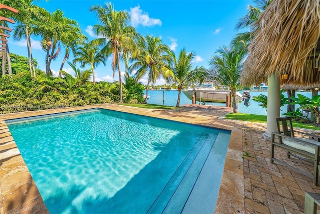 425 N Shore Dr, Miami Beach, FL 33141 - swimming pool with a boat dock and a water view