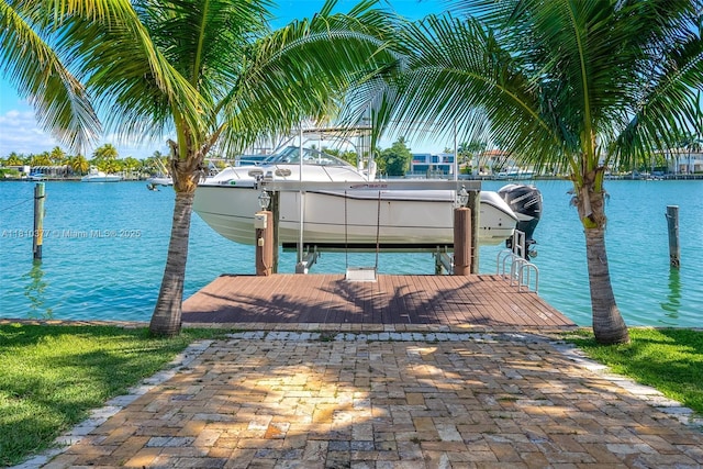 425 N Shore Dr, Miami Beach, FL 33141 - dock area featuring boat lift and a water view