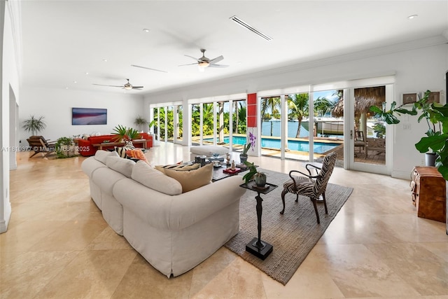 425 N Shore Dr, Miami Beach, FL 33141 - living area with ceiling fan, crown molding, and light tile patterned flooring