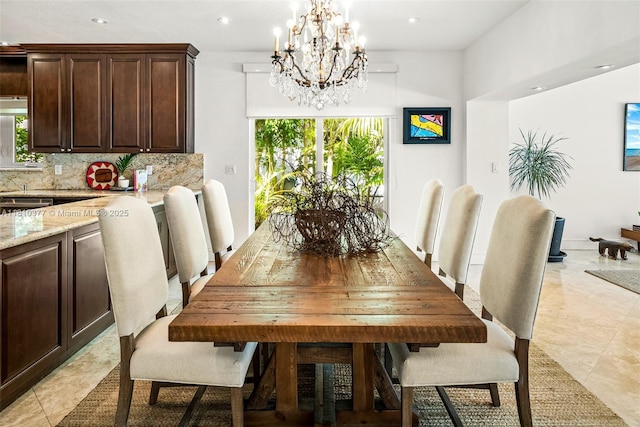 425 N Shore Dr, Miami Beach, FL 33141 - dining space with a chandelier, healthy amount of natural light, recessed lighting, and light tile patterned flooring
