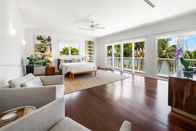 425 N Shore Dr, Miami Beach, FL 33141 - bedroom with access to exterior, multiple windows, crown molding, and wood finished floors