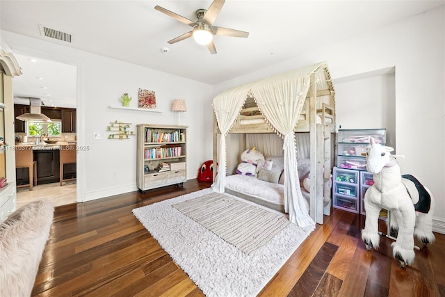 425 N Shore Dr, Miami Beach, FL 33141 - bedroom with wood finished floors, baseboards, a ceiling fan, and recessed lighting
