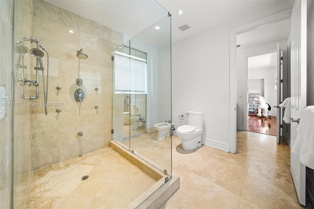425 N Shore Dr, Miami Beach, FL 33141 - ensuite bathroom featuring a bidet, a stall shower, toilet, and recessed lighting