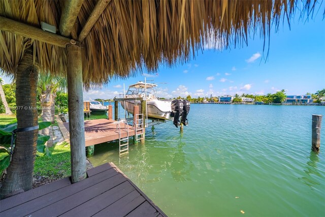 425 N Shore Dr, Miami Beach, FL 33141 - dock area featuring a water view and boat lift
