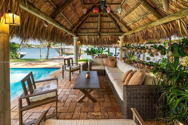 425 N Shore Dr, Miami Beach, FL 33141 - view of patio featuring a gazebo, an outdoor living space, an outdoor pool, and a water view