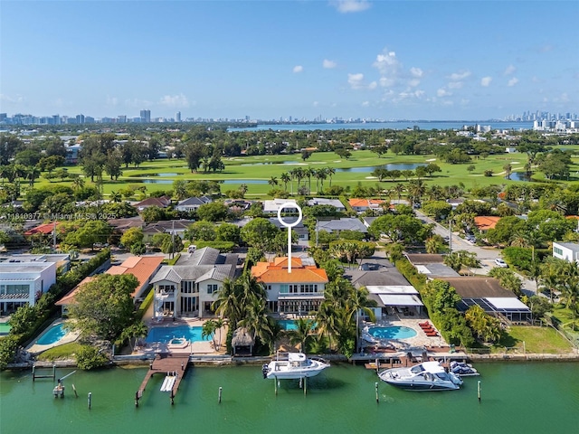 425 N Shore Dr, Miami Beach, FL 33141 - drone / aerial view of city skyline, a pool, and a nearby body of water