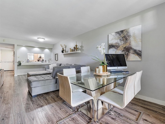 8411 Forest Hills Dr Unit 307, Coral Springs, FL 33065 - dining room with wood finished floors and baseboards