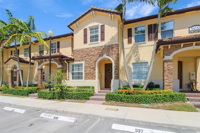 9051 SW 227th St Unit 2, Cutler Bay, FL 33190 - multi unit property with stone siding, stucco siding, uncovered parking, and a tile roof