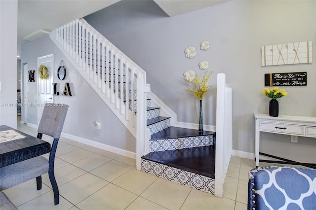 9051 SW 227th St Unit 2, Cutler Bay, FL 33190 - foyer entrance with stairway, light tile patterned floors, and baseboards
