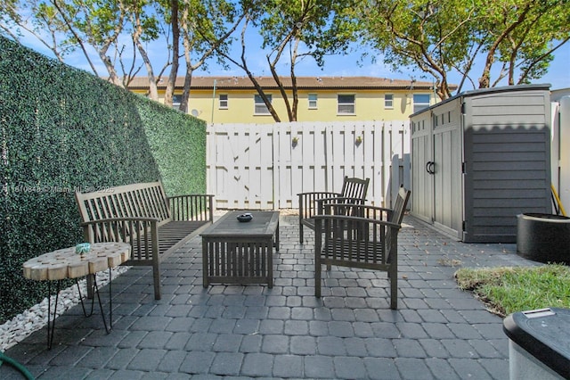9051 SW 227th St Unit 2, Cutler Bay, FL 33190 - fenced backyard featuring a patio and outdoor lounge area