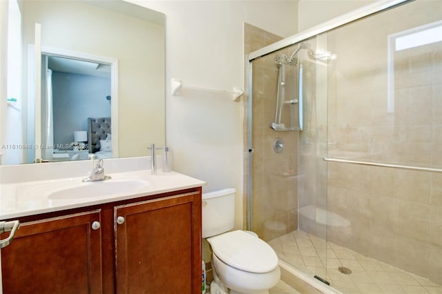 9051 SW 227th St Unit 2, Cutler Bay, FL 33190 - bathroom with toilet, vanity, and a shower stall