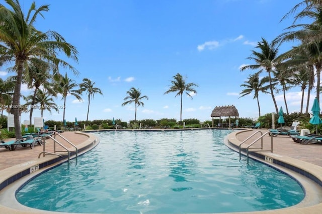 3901 S Ocean Dr Unit 1B, Hollywood, FL 33019 - community pool with a gazebo and a patio area