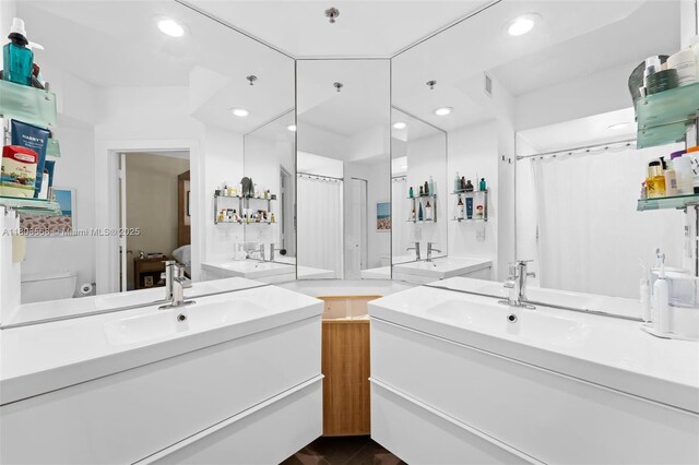 3245 NE 184th St Unit 13402, Aventura, FL 33160 - full bath with two vanities, recessed lighting, and toilet