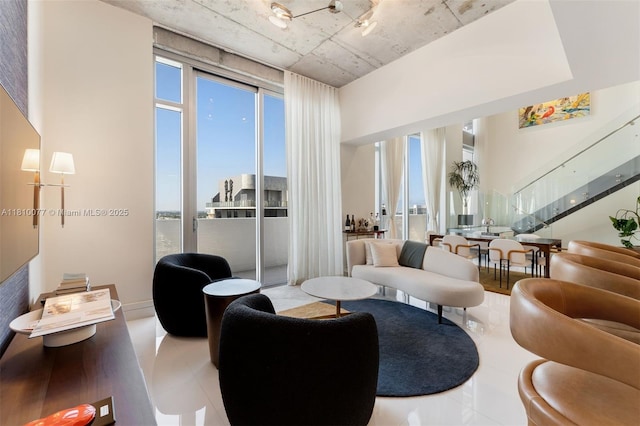 3301 NE 1st Ave Unit Ph7, Miami, FL 33137 - tiled living area with stairs